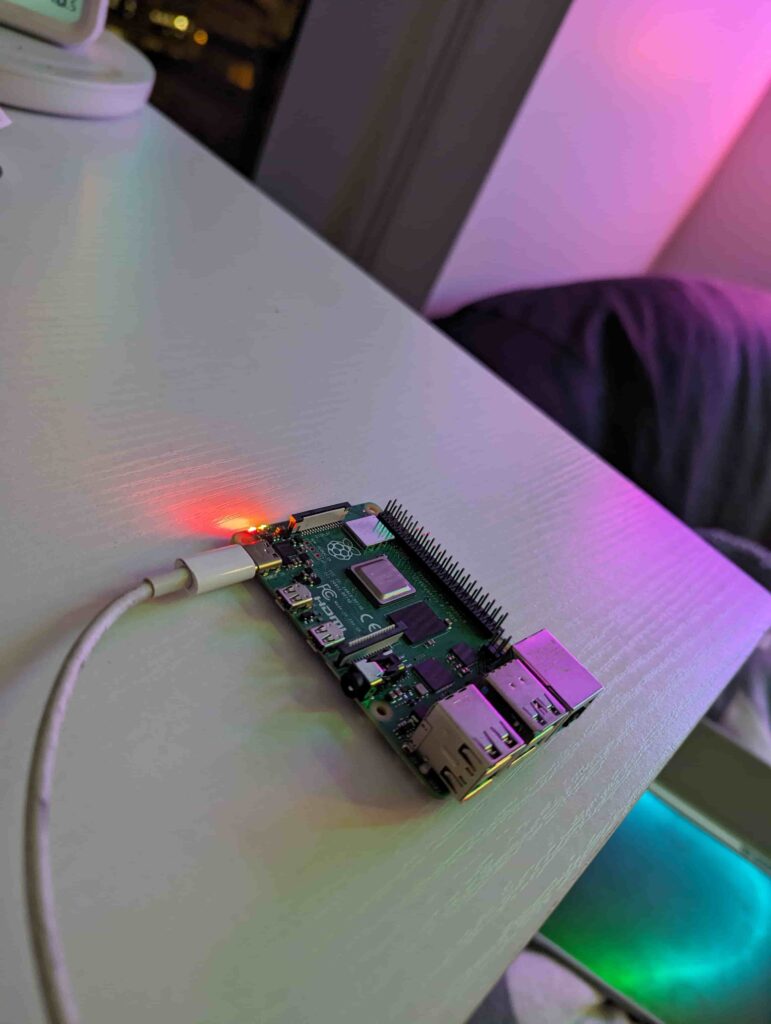an image of a raspberry pi that has a red blinking light